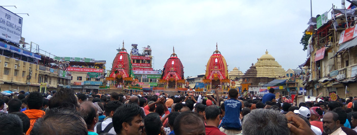 Three colorful Chariots parked at Lion's Gate