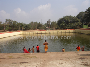 Devotees taking Holy dip in Parvati Sagara