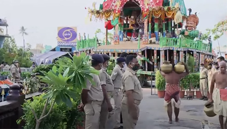 Pani Apata servitors taking the water with brass container to the chariots