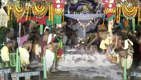 Servitors breaking of the earthen pots after Sodosha Upachara Pooja