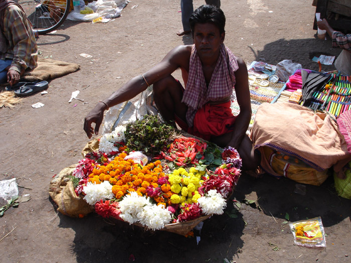 Vendor selling flowers for the Deities