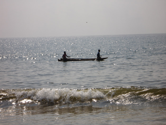 Fishermen Sailing their Boat in Puri Sea Beach